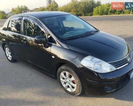 Черный Ниссан Тиида, объемом двигателя 1.8 л и пробегом 110 тыс. км за 7300 $, фото 1 на Automoto.ua