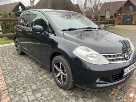 Черный Ниссан Тиида, объемом двигателя 1.5 л и пробегом 102 тыс. км за 7400 $, фото 1 на Automoto.ua