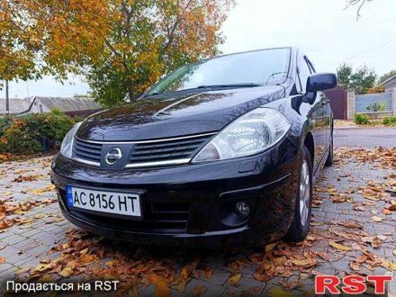 Черный Ниссан Тиида, объемом двигателя 1.8 л и пробегом 110 тыс. км за 5600 $, фото 1 на Automoto.ua