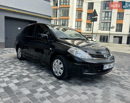Черный Ниссан Тиида, объемом двигателя 1.6 л и пробегом 192 тыс. км за 5499 $, фото 1 на Automoto.ua