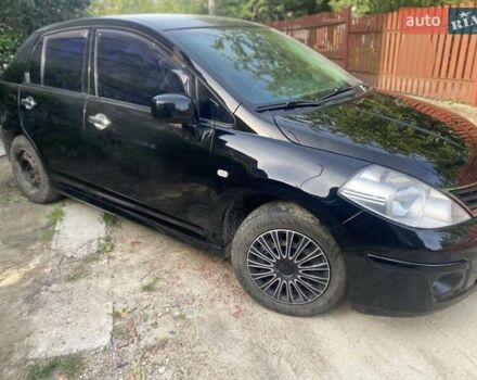 Черный Ниссан Тиида, объемом двигателя 1.6 л и пробегом 182 тыс. км за 3200 $, фото 1 на Automoto.ua