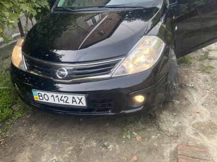 Черный Ниссан Тиида, объемом двигателя 1.6 л и пробегом 182 тыс. км за 3250 $, фото 1 на Automoto.ua
