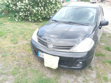 Ніссан Тііда 2011 у Харкові на Automoto.ua Чорний Ніссан Тііда, об'ємом двигуна 1.6 л та пробігом 156 тис. км за 5100 $, фото 1 на Automoto.ua