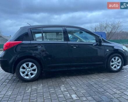 Черный Ниссан Тиида, объемом двигателя 1.6 л и пробегом 200 тыс. км за 8200 $, фото 1 на Automoto.ua