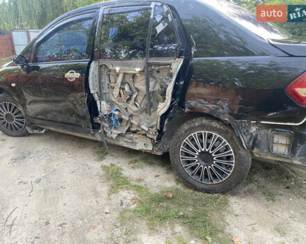 Черный Ниссан Тиида, объемом двигателя 1.6 л и пробегом 182 тыс. км за 3500 $, фото 1 на Automoto.ua