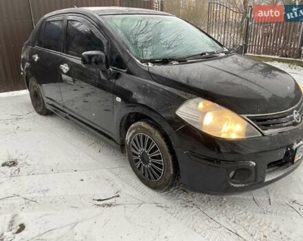 Черный Ниссан Тиида, объемом двигателя 1.6 л и пробегом 182 тыс. км за 3200 $, фото 1 на Automoto.ua
