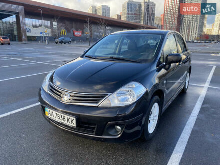 Черный Ниссан Тиида, объемом двигателя 1.6 л и пробегом 138 тыс. км за 7700 $, фото 1 на Automoto.ua