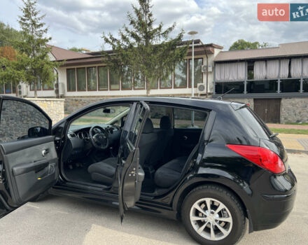 Черный Ниссан Тиида, объемом двигателя 1.6 л и пробегом 190 тыс. км за 7500 $, фото 1 на Automoto.ua