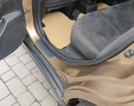 Коричневий Ніссан Тііда, об'ємом двигуна 1.6 л та пробігом 200 тис. км за 6490 $, фото 9 на Automoto.ua