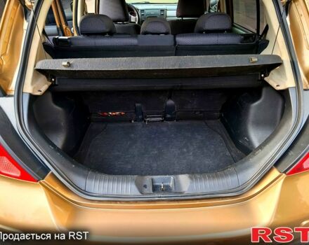 Коричневый Ниссан Тиида, объемом двигателя 1.5 л и пробегом 260 тыс. км за 5000 $, фото 11 на Automoto.ua