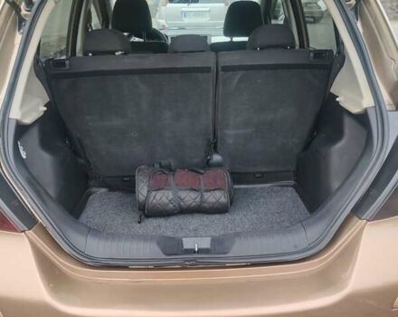 Коричневий Ніссан Тііда, об'ємом двигуна 1.6 л та пробігом 200 тис. км за 6490 $, фото 23 на Automoto.ua