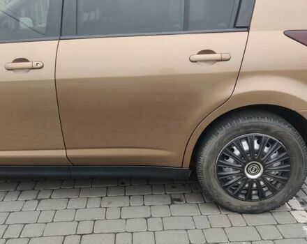 Коричневий Ніссан Тііда, об'ємом двигуна 1.6 л та пробігом 200 тис. км за 6490 $, фото 26 на Automoto.ua