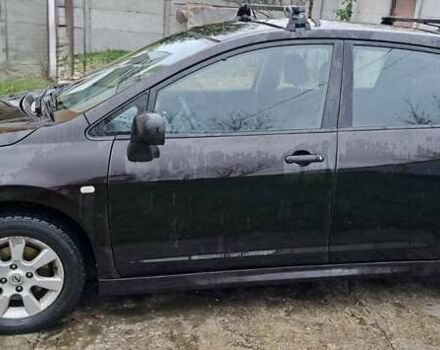 Коричневий Ніссан Тііда, об'ємом двигуна 1.6 л та пробігом 205 тис. км за 7500 $, фото 2 на Automoto.ua