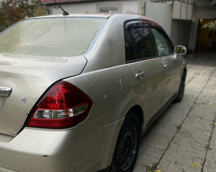 Коричневый Ниссан Тиида, объемом двигателя 1.5 л и пробегом 75 тыс. км за 3400 $, фото 3 на Automoto.ua