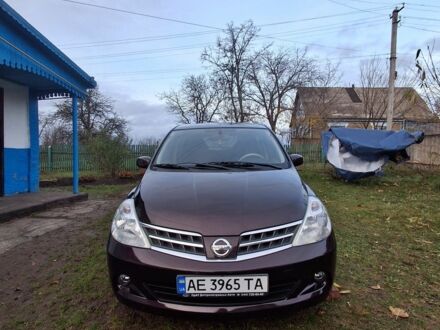 Коричневый Ниссан Тиида, объемом двигателя 1.5 л и пробегом 87 тыс. км за 9000 $, фото 1 на Automoto.ua