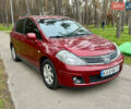 Красный Ниссан Тиида, объемом двигателя 1.6 л и пробегом 100 тыс. км за 6500 $, фото 2 на Automoto.ua