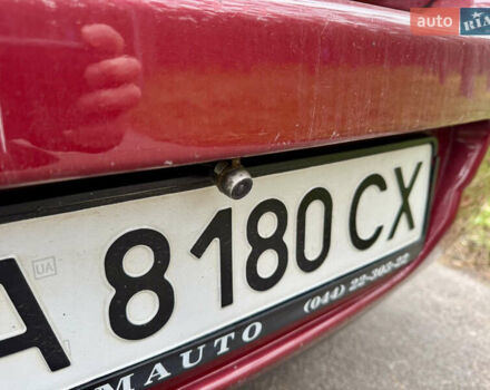 Красный Ниссан Тиида, объемом двигателя 1.6 л и пробегом 100 тыс. км за 6500 $, фото 7 на Automoto.ua