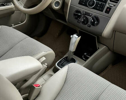 Красный Ниссан Тиида, объемом двигателя 1.6 л и пробегом 160 тыс. км за 6550 $, фото 7 на Automoto.ua