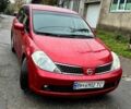 Красный Ниссан Тиида, объемом двигателя 1.6 л и пробегом 160 тыс. км за 6600 $, фото 1 на Automoto.ua