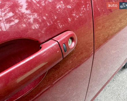 Красный Ниссан Тиида, объемом двигателя 1.6 л и пробегом 100 тыс. км за 6500 $, фото 5 на Automoto.ua