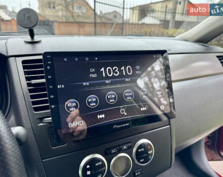 Красный Ниссан Тиида, объемом двигателя 1.6 л и пробегом 100 тыс. км за 6500 $, фото 47 на Automoto.ua