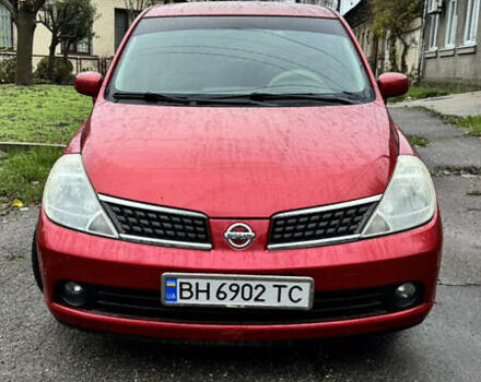 Красный Ниссан Тиида, объемом двигателя 1.6 л и пробегом 160 тыс. км за 6550 $, фото 1 на Automoto.ua