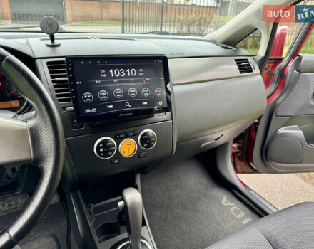 Красный Ниссан Тиида, объемом двигателя 1.6 л и пробегом 100 тыс. км за 6500 $, фото 49 на Automoto.ua