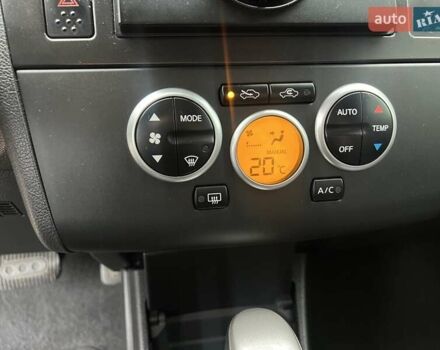 Красный Ниссан Тиида, объемом двигателя 1.6 л и пробегом 100 тыс. км за 6500 $, фото 16 на Automoto.ua