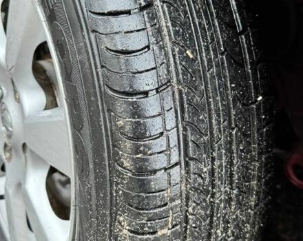 Красный Ниссан Тиида, объемом двигателя 1.6 л и пробегом 160 тыс. км за 6600 $, фото 10 на Automoto.ua