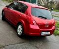 Красный Ниссан Тиида, объемом двигателя 1.6 л и пробегом 160 тыс. км за 6600 $, фото 2 на Automoto.ua