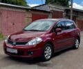 Красный Ниссан Тиида, объемом двигателя 1.6 л и пробегом 154 тыс. км за 6500 $, фото 1 на Automoto.ua