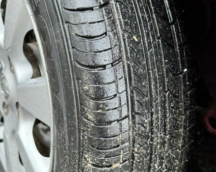 Красный Ниссан Тиида, объемом двигателя 1.6 л и пробегом 160 тыс. км за 6550 $, фото 9 на Automoto.ua