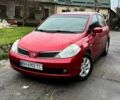Красный Ниссан Тиида, объемом двигателя 1.6 л и пробегом 160 тыс. км за 6600 $, фото 1 на Automoto.ua