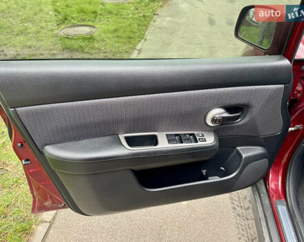 Красный Ниссан Тиида, объемом двигателя 1.6 л и пробегом 100 тыс. км за 6500 $, фото 52 на Automoto.ua