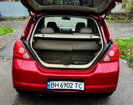 Красный Ниссан Тиида, объемом двигателя 1.6 л и пробегом 160 тыс. км за 6600 $, фото 3 на Automoto.ua