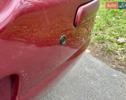 Красный Ниссан Тиида, объемом двигателя 1.6 л и пробегом 100 тыс. км за 6500 $, фото 14 на Automoto.ua