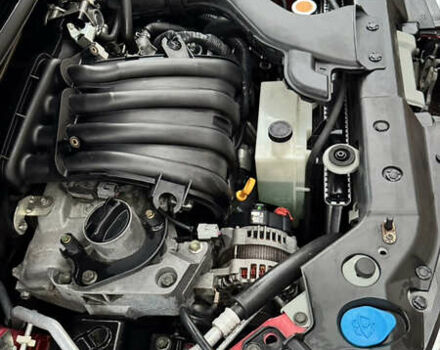 Красный Ниссан Тиида, объемом двигателя 1.6 л и пробегом 160 тыс. км за 6550 $, фото 12 на Automoto.ua