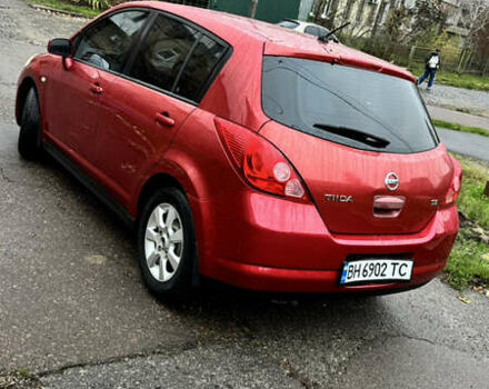 Красный Ниссан Тиида, объемом двигателя 1.6 л и пробегом 160 тыс. км за 6550 $, фото 2 на Automoto.ua