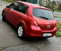 Красный Ниссан Тиида, объемом двигателя 1.6 л и пробегом 160 тыс. км за 6550 $, фото 2 на Automoto.ua