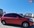 Красный Ниссан Тиида, объемом двигателя 1.6 л и пробегом 144 тыс. км за 6300 $, фото 1 на Automoto.ua