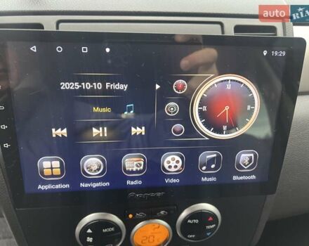 Красный Ниссан Тиида, объемом двигателя 1.6 л и пробегом 100 тыс. км за 6500 $, фото 11 на Automoto.ua