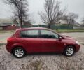 Красный Ниссан Тиида, объемом двигателя 1.6 л и пробегом 145 тыс. км за 5387 $, фото 13 на Automoto.ua