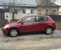 Красный Ниссан Тиида, объемом двигателя 1.6 л и пробегом 145 тыс. км за 5387 $, фото 1 на Automoto.ua