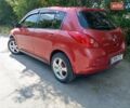 Красный Ниссан Тиида, объемом двигателя 1.6 л и пробегом 179 тыс. км за 6000 $, фото 11 на Automoto.ua