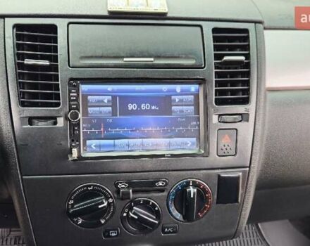 Красный Ниссан Тиида, объемом двигателя 1.6 л и пробегом 149 тыс. км за 5700 $, фото 17 на Automoto.ua