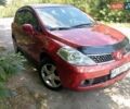 Красный Ниссан Тиида, объемом двигателя 1.6 л и пробегом 179 тыс. км за 6000 $, фото 1 на Automoto.ua
