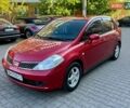 Красный Ниссан Тиида, объемом двигателя 1.6 л и пробегом 128 тыс. км за 6899 $, фото 1 на Automoto.ua