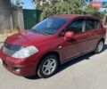 Красный Ниссан Тиида, объемом двигателя 1.8 л и пробегом 175 тыс. км за 5600 $, фото 1 на Automoto.ua