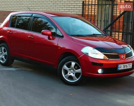 Красный Ниссан Тиида, объемом двигателя 1.6 л и пробегом 180 тыс. км за 5999 $, фото 1 на Automoto.ua
