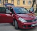 Красный Ниссан Тиида, объемом двигателя 1.6 л и пробегом 218 тыс. км за 5650 $, фото 1 на Automoto.ua